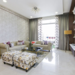 Contemporary 4-BHK Design with Floral Accents and Wooden Elements